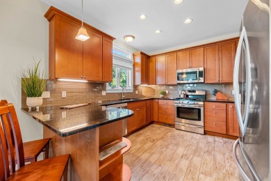 Immaculately maintained 4-bedroom, 5  1/2 -bath contemporary on Stowe Country Club in Vermont - for sale on GolfHomes.com, golf home, golf lot