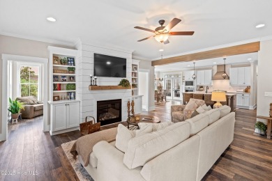This nearly new residence is situated on a corner lot within the on Members Club At St. James Plantation in North Carolina - for sale on GolfHomes.com, golf home, golf lot