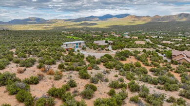 Nestled by a pristine golf course in the heart of a mountain on Paa-Ko Ridge Golf Club  in New Mexico - for sale on GolfHomes.com, golf home, golf lot