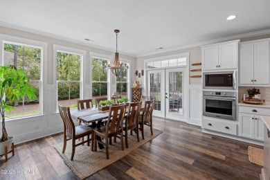This nearly new residence is situated on a corner lot within the on Members Club At St. James Plantation in North Carolina - for sale on GolfHomes.com, golf home, golf lot