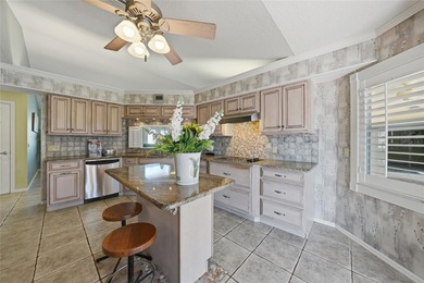 Nestled in a highly desirable golfing community just minutes on Rotonda Golf and Country Club The Links Course in Florida - for sale on GolfHomes.com, golf home, golf lot