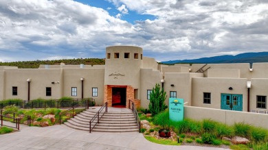 Nestled by a pristine golf course in the heart of a mountain on Paa-Ko Ridge Golf Club  in New Mexico - for sale on GolfHomes.com, golf home, golf lot