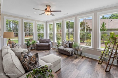 This nearly new residence is situated on a corner lot within the on Members Club At St. James Plantation in North Carolina - for sale on GolfHomes.com, golf home, golf lot