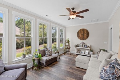 This nearly new residence is situated on a corner lot within the on Members Club At St. James Plantation in North Carolina - for sale on GolfHomes.com, golf home, golf lot
