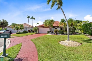 Welcome to your retreat in Boca Raton! This single-story home on Boca Woods Country Club in Florida - for sale on GolfHomes.com, golf home, golf lot