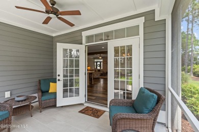 This nearly new residence is situated on a corner lot within the on Members Club At St. James Plantation in North Carolina - for sale on GolfHomes.com, golf home, golf lot