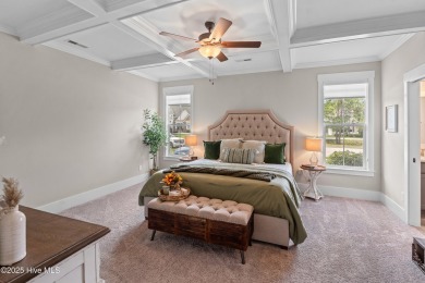 This nearly new residence is situated on a corner lot within the on Members Club At St. James Plantation in North Carolina - for sale on GolfHomes.com, golf home, golf lot