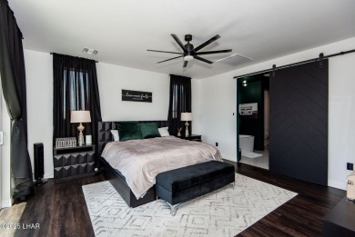 Presenting 6393 S Via De Oro, Fort Mohave, Arizona, a custom on Los Lagos Golf Club in Arizona - for sale on GolfHomes.com, golf home, golf lot