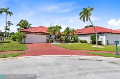 Welcome to your retreat in Boca Raton! This single-story home on Boca Woods Country Club in Florida - for sale on GolfHomes.com, golf home, golf lot