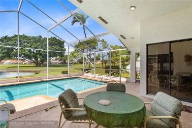 Welcome to your retreat in Boca Raton! This single-story home on Boca Woods Country Club in Florida - for sale on GolfHomes.com, golf home, golf lot