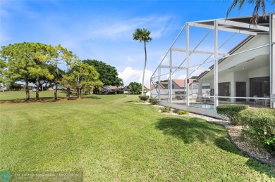 Welcome to your retreat in Boca Raton! This single-story home on Boca Woods Country Club in Florida - for sale on GolfHomes.com, golf home, golf lot