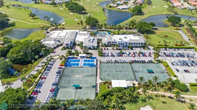 Welcome to your retreat in Boca Raton! This single-story home on Boca Woods Country Club in Florida - for sale on GolfHomes.com, golf home, golf lot