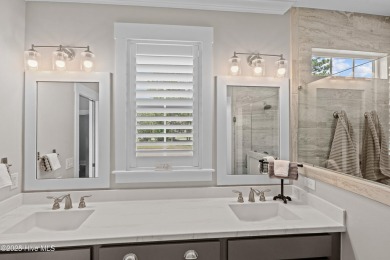 This nearly new residence is situated on a corner lot within the on Members Club At St. James Plantation in North Carolina - for sale on GolfHomes.com, golf home, golf lot