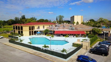 TOP FLOOR CONDO WITH BEAUTIFUL GOLF VIEWS, SUNSETS & BREEZES! on Poinciana Golf Club in Florida - for sale on GolfHomes.com, golf home, golf lot