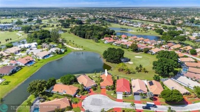 Welcome to your retreat in Boca Raton! This single-story home on Boca Woods Country Club in Florida - for sale on GolfHomes.com, golf home, golf lot