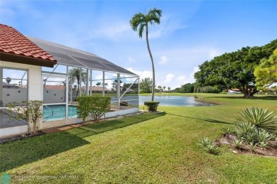 Welcome to your retreat in Boca Raton! This single-story home on Boca Woods Country Club in Florida - for sale on GolfHomes.com, golf home, golf lot