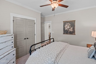 This nearly new residence is situated on a corner lot within the on Members Club At St. James Plantation in North Carolina - for sale on GolfHomes.com, golf home, golf lot