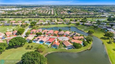 Welcome to your retreat in Boca Raton! This single-story home on Boca Woods Country Club in Florida - for sale on GolfHomes.com, golf home, golf lot