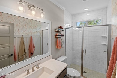 This nearly new residence is situated on a corner lot within the on Members Club At St. James Plantation in North Carolina - for sale on GolfHomes.com, golf home, golf lot
