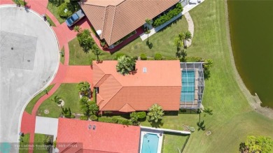 Welcome to your retreat in Boca Raton! This single-story home on Boca Woods Country Club in Florida - for sale on GolfHomes.com, golf home, golf lot