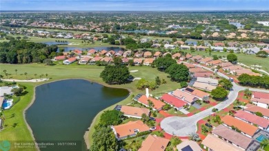 Welcome to your retreat in Boca Raton! This single-story home on Boca Woods Country Club in Florida - for sale on GolfHomes.com, golf home, golf lot