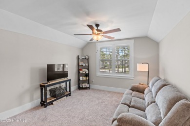 This nearly new residence is situated on a corner lot within the on Members Club At St. James Plantation in North Carolina - for sale on GolfHomes.com, golf home, golf lot