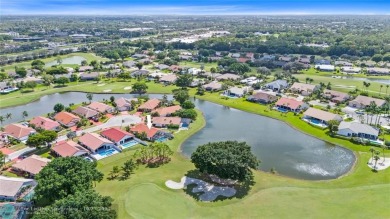 Welcome to your retreat in Boca Raton! This single-story home on Boca Woods Country Club in Florida - for sale on GolfHomes.com, golf home, golf lot