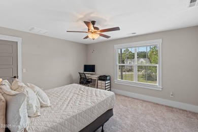 This nearly new residence is situated on a corner lot within the on Members Club At St. James Plantation in North Carolina - for sale on GolfHomes.com, golf home, golf lot
