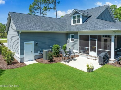 This nearly new residence is situated on a corner lot within the on Members Club At St. James Plantation in North Carolina - for sale on GolfHomes.com, golf home, golf lot