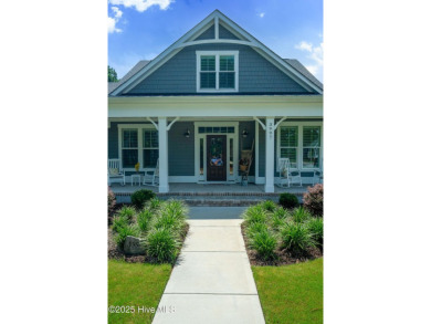 This nearly new residence is situated on a corner lot within the on Members Club At St. James Plantation in North Carolina - for sale on GolfHomes.com, golf home, golf lot