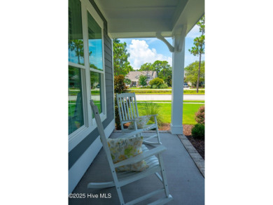 This nearly new residence is situated on a corner lot within the on Members Club At St. James Plantation in North Carolina - for sale on GolfHomes.com, golf home, golf lot