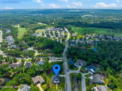 This nearly new residence is situated on a corner lot within the on Members Club At St. James Plantation in North Carolina - for sale on GolfHomes.com, golf home, golf lot