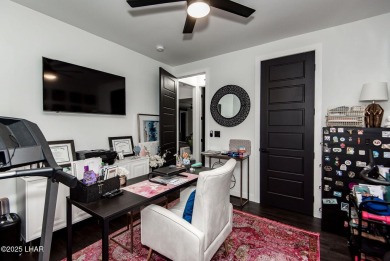Presenting 6393 S Via De Oro, Fort Mohave, Arizona, a custom on Los Lagos Golf Club in Arizona - for sale on GolfHomes.com, golf home, golf lot