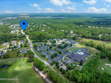 This nearly new residence is situated on a corner lot within the on Members Club At St. James Plantation in North Carolina - for sale on GolfHomes.com, golf home, golf lot