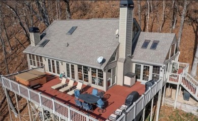 THAT VIEW . . . This perfect mountain cabin sits at over 3000 on Big Canoe Golf Club - Cherokee in Georgia - for sale on GolfHomes.com, golf home, golf lot