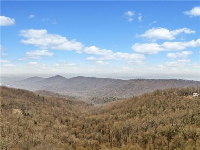THAT VIEW . . . This perfect mountain cabin sits at over 3000 on Big Canoe Golf Club - Cherokee in Georgia - for sale on GolfHomes.com, golf home, golf lot