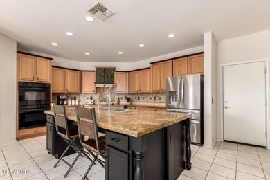 Spacious 5 bedroom, 3 bathroom home with pool in the highly on Trilogy Golf Club At Power Ranch in Arizona - for sale on GolfHomes.com, golf home, golf lot