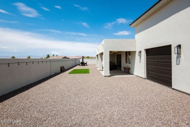 Presenting 6393 S Via De Oro, Fort Mohave, Arizona, a custom on Los Lagos Golf Club in Arizona - for sale on GolfHomes.com, golf home, golf lot