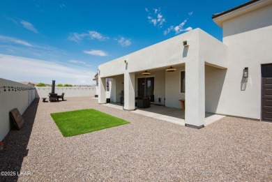 Presenting 6393 S Via De Oro, Fort Mohave, Arizona, a custom on Los Lagos Golf Club in Arizona - for sale on GolfHomes.com, golf home, golf lot