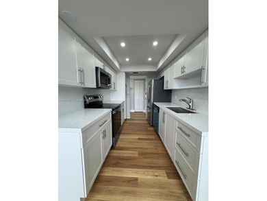 EXCELENT OPPORTUNITY. Light, Bright, and feels like HOME. This on Pembroke Lakes Golf Club in Florida - for sale on GolfHomes.com, golf home, golf lot