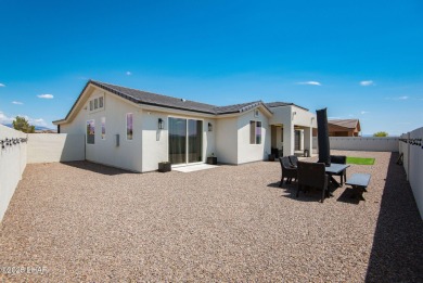 Presenting 6393 S Via De Oro, Fort Mohave, Arizona, a custom on Los Lagos Golf Club in Arizona - for sale on GolfHomes.com, golf home, golf lot