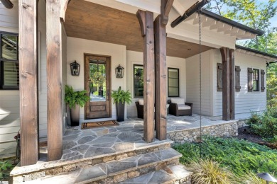 Nestled in a quiet cove,  with coveted southern exposure, this on The Reserve At Lake Keowee in South Carolina - for sale on GolfHomes.com, golf home, golf lot
