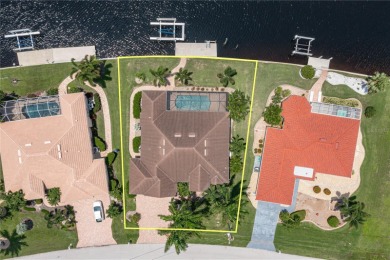 WATERFRONT HOME IN PGI W/SAIL ACCESS & 91FT OF SEAWALL! Check on Saint Andrews South Golf Club in Florida - for sale on GolfHomes.com, golf home, golf lot