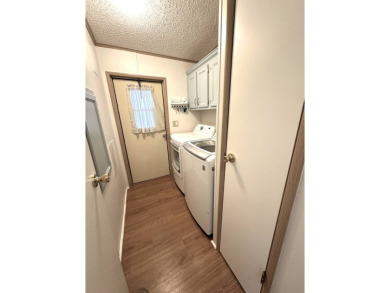 SCGC is a 55 plus, lot rent, 495 acres manufactured home on Schalamar Creek Golf and Country Club in Florida - for sale on GolfHomes.com, golf home, golf lot