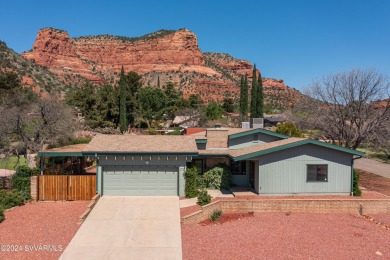 Charming single level home featuring floor-to-ceiling windows on Oakcreek Country Club in Arizona - for sale on GolfHomes.com, golf home, golf lot