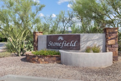Located in Rancho Vistoso, this Elevation C Plan with Stone sits on The Golf Club at Vistoso in Arizona - for sale on GolfHomes.com, golf home, golf lot