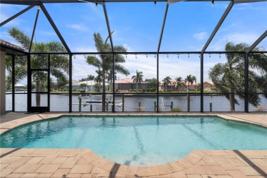 WATERFRONT HOME IN PGI W/SAIL ACCESS & 91FT OF SEAWALL! Check on Saint Andrews South Golf Club in Florida - for sale on GolfHomes.com, golf home, golf lot