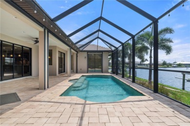 WATERFRONT HOME IN PGI W/SAIL ACCESS & 91FT OF SEAWALL! Check on Saint Andrews South Golf Club in Florida - for sale on GolfHomes.com, golf home, golf lot
