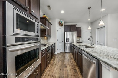 Beautifully maintained 2018 move-in ready single-level home with on Farmstead Golf Links in North Carolina - for sale on GolfHomes.com, golf home, golf lot