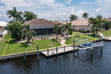 WATERFRONT HOME IN PGI W/SAIL ACCESS & 91FT OF SEAWALL! Check on Saint Andrews South Golf Club in Florida - for sale on GolfHomes.com, golf home, golf lot